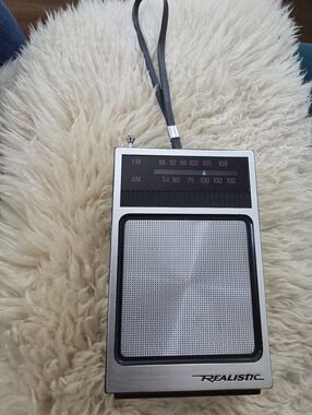 Vintage Realistic AM/FM portable transistor radio, model 12-714.